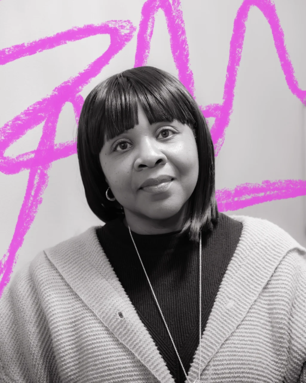 a close up black and white portrait of a woman with a dark bob haircut. Behind her is a hand-drawn scribble in neon pink.